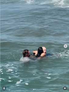 Luas Taub rescuing Chris and Coco Greene from rip current in Oceanside, CA